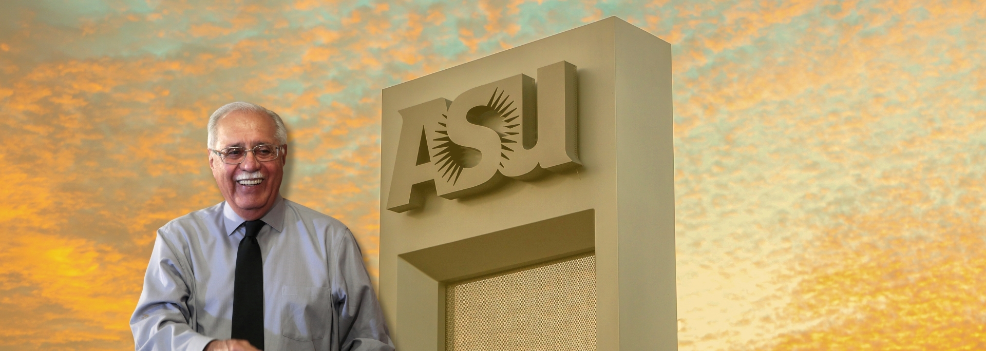 Congressman Pastor with an ASU themed background